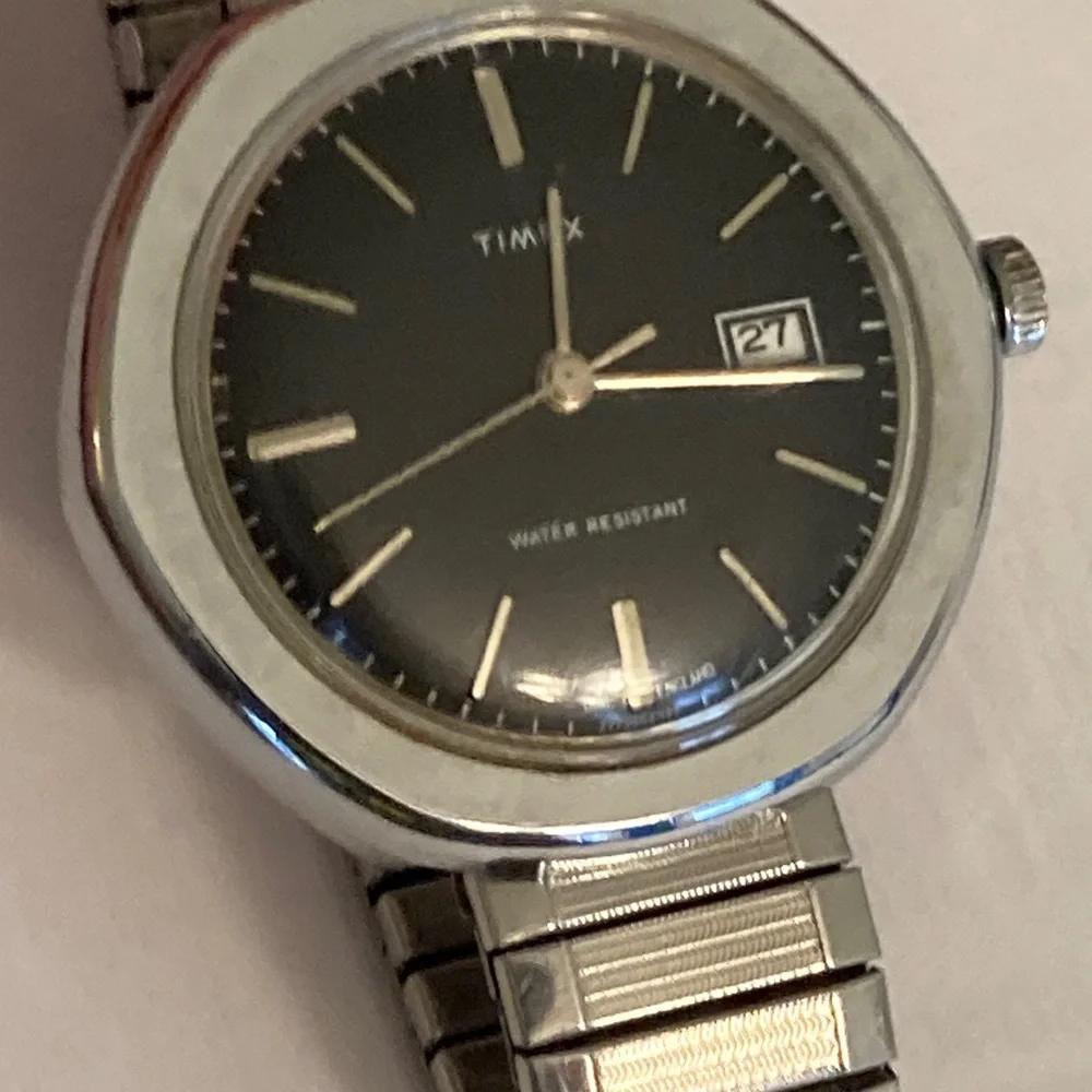 Vintage Timex watch, black dial, domed crystal, 2 straps, 1 leather, 1 stainless